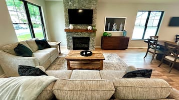Smart TV, fireplace, books