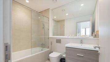 Hair dryer, bidet, towels, soap