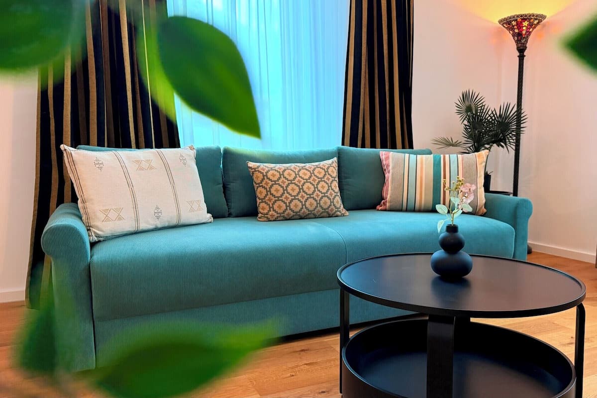 Comfort Apartment, 2 Bedrooms, Non Smoking | Living area | 55-inch Smart TV with digital channels