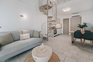 Appartement Luxe, vue canal | Coin séjour