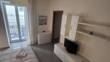 Desk, blackout drapes, soundproofing, iron/ironing board