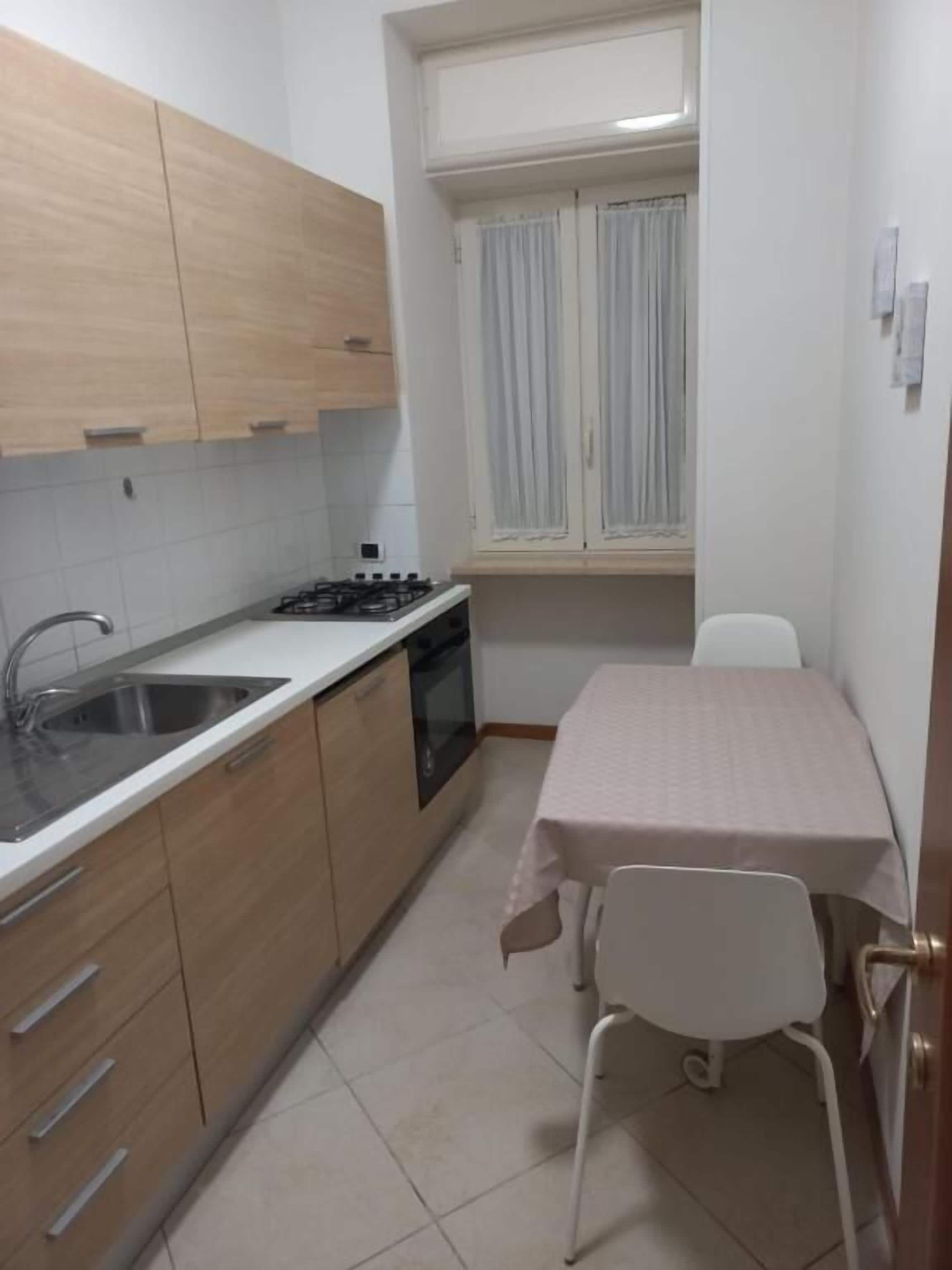 Apartment, Balcony, City View | Private kitchen | Fridge, oven, stovetop, cookware/dishes/utensils