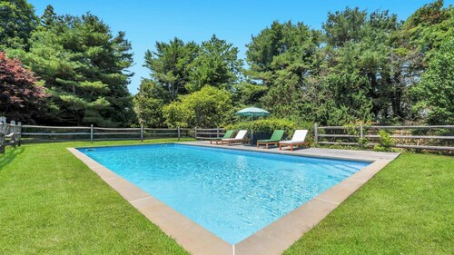 Beautifully updated Water Mill retreat with a private pool, expansive...