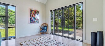 Beautifully updated Water Mill retreat with a private pool, expansive...
