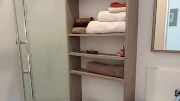 Shower, towels, soap, shampoo