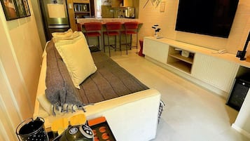 Apartamento | Área de estar | Smart TV 55 polegadas com canais digitais, Netflix