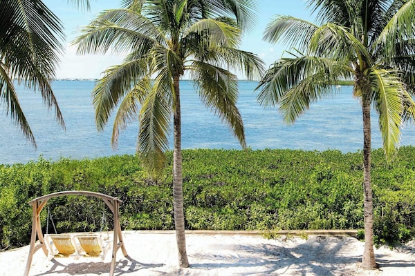 Wake up to sea breezes and swaying palms outside.