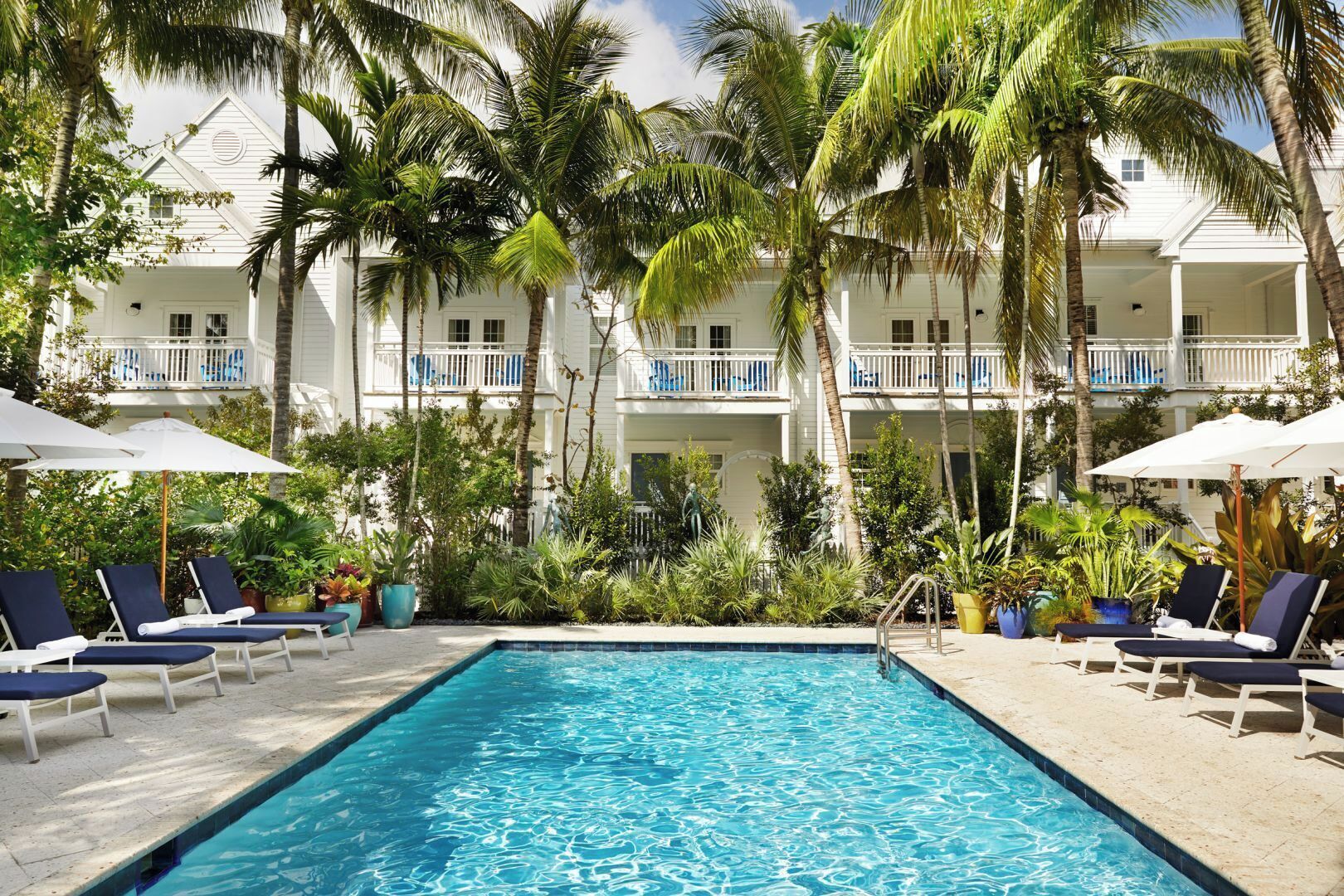 Bask in bright sunshine beside the crystal-clear resort pool.