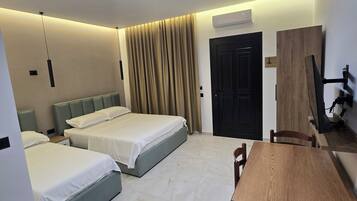 Comfort Triple Room, Balcony, Garden View | Desk, WiFi (free)
