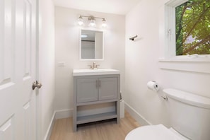 Shower, hair dryer, towels, shampoo