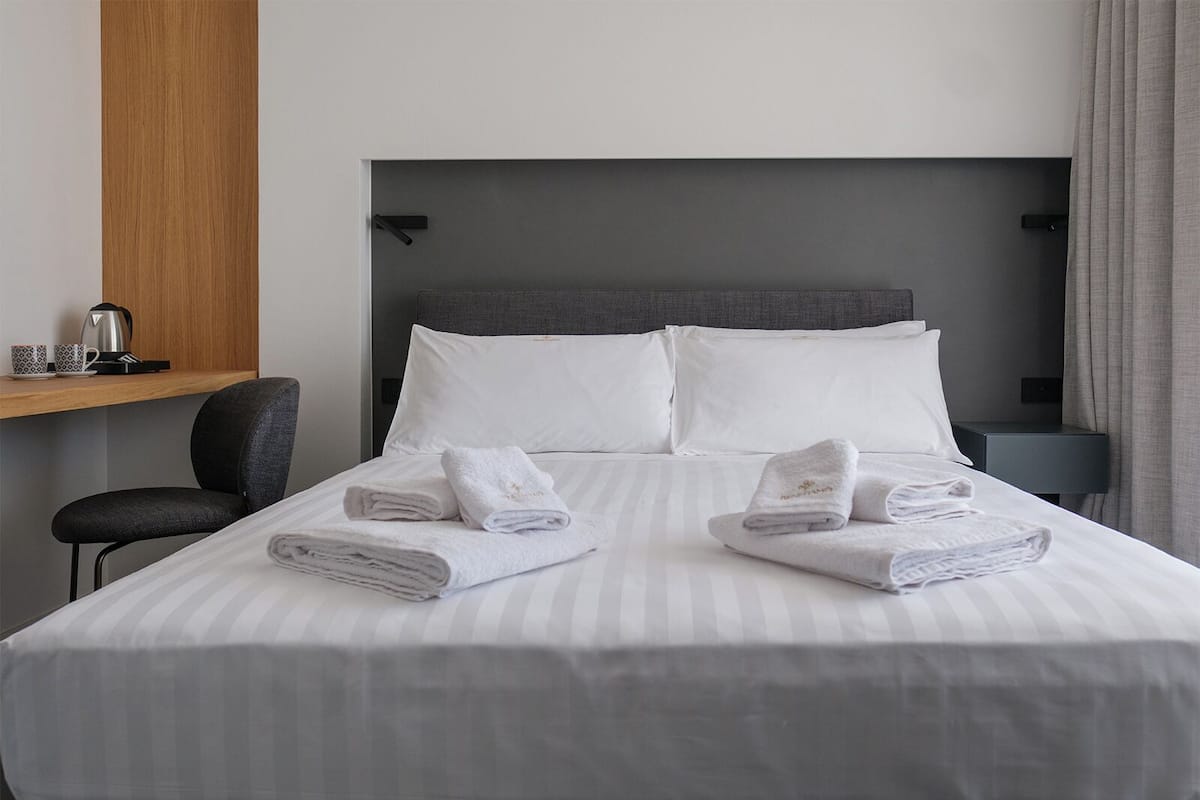 Deluxe Room, City View | Premium bedding, down duvets, minibar, in-room safe