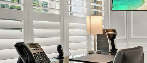 Deluxe Room, Pool View | Desk, laptop workspace, blackout curtains