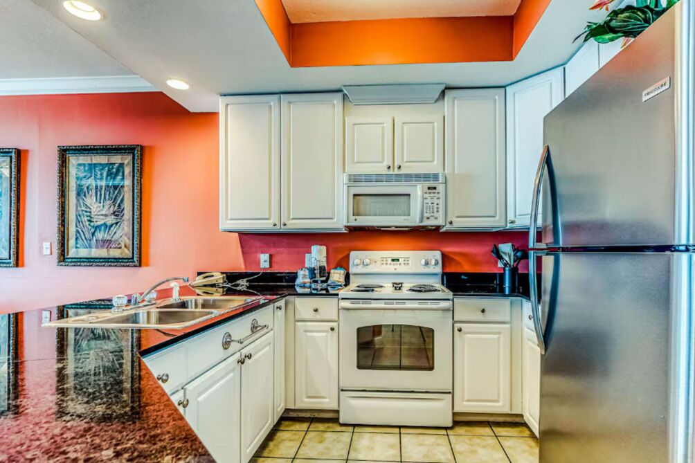 Coffee/tea maker, fridge, microwave, oven