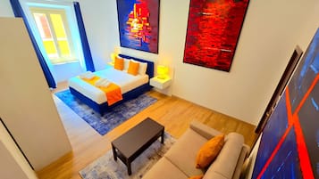 Suíte superluxo, vista para a cidade | Área de estar