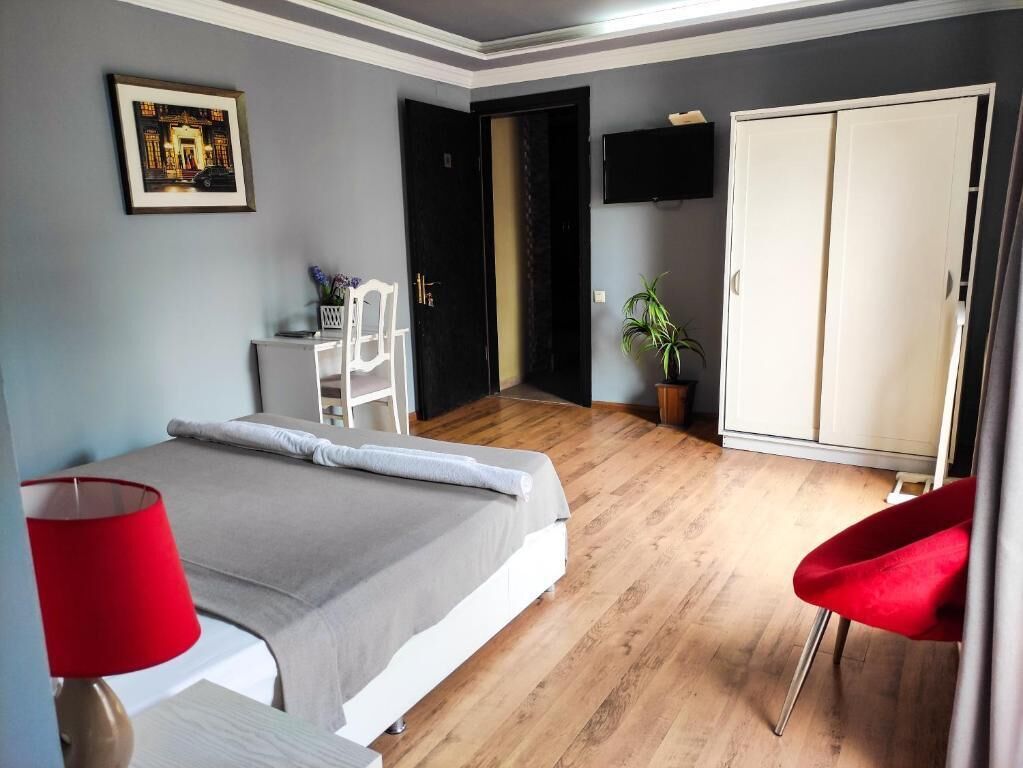 Deluxe Double Room, Balcony, City View | Desk, laptop workspace, iron/ironing board (on request), free WiFi
