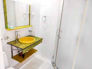 Deluxe Double Room, Balcony, City View | Bathroom | Shower, hair dryer, slippers, towels