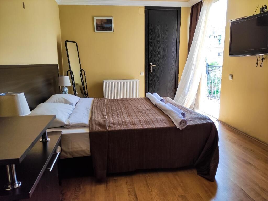Basic Double Room, Balcony, City View | Desk, laptop workspace, iron/ironing board (on request), free WiFi
