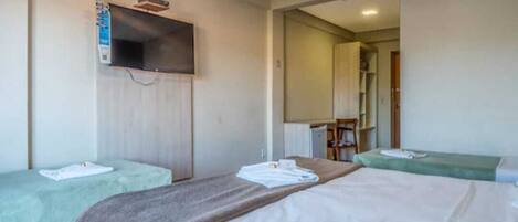 Room, City View | Blackout curtains, iron/ironing board (on request), free WiFi