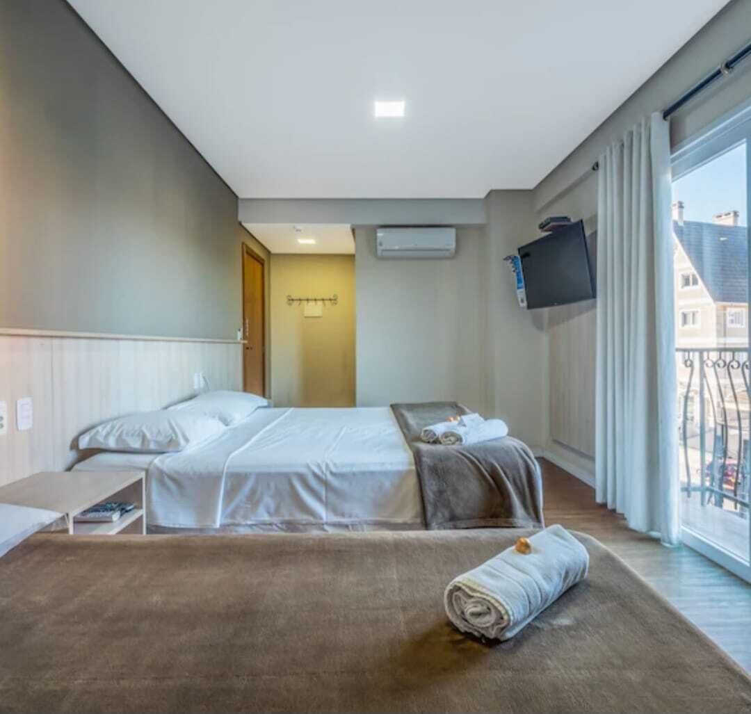 Double Room, Balcony, City View | Blackout drapes, iron/ironing board (on request), WiFi (free)