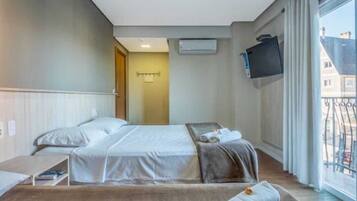 Double Room, Balcony, City View | Blackout drapes, iron/ironing board (on request), WiFi (free)