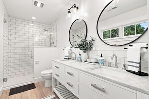 Shower, hair dryer, towels, soap
