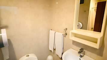 Basic Room | Bathroom | Shower, towels, soap, toilet paper