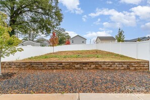 Property grounds - Sleeps 9 · New 2024 Build · 8 Min to Airport & Uptown · Fenced Yard · Dogs OK (Charlotte)