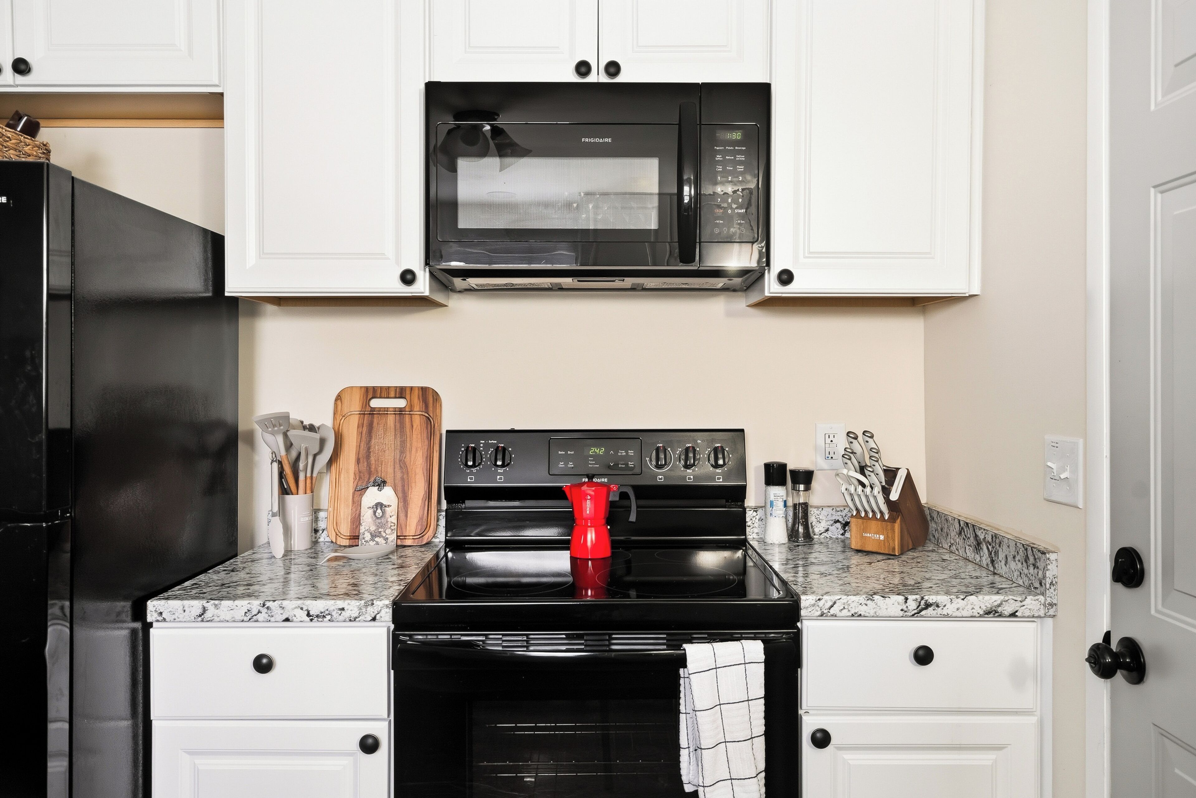 Coffee/tea maker, fridge, microwave, oven