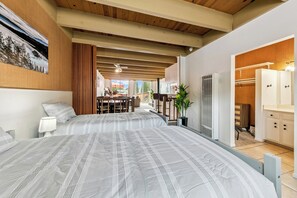 A hotel room with a large bed, a dining area, and a bathroom. - Tahoe Keys Studio Retreat - HOA Amenities (South Lake Tahoe)