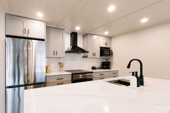 Coffee/tea maker, fridge, microwave, oven - Rooftop Patio Downtown GH: Steps to Lake & Dining (Grand Haven)