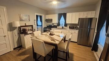 Coffee/tea maker, fridge, microwave, oven