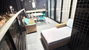 Deluxe Apartment, Beachfront | Terrace/patio