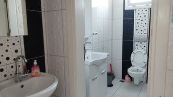 Hair dryer, towels, soap, toilet paper