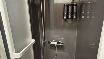Hair dryer, towels, soap, shampoo