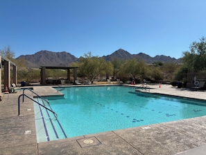 A swimming pool with a view of mountains in the background. - Winter in AZ!! Early bird pricing!! 1000.00 DOLLARS OFF for any 2 month stay!! (Scottsdale)