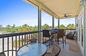Outdoor dining - Sunset Pointe Retreat  Bay Views • Beach Access • Pool • Kayak, Paddle Board (Port St. Joe)