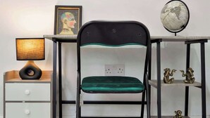 A desk with a globe, a lamp, and a framed picture. - Belvedere 4-Bed Apt, Sleeps 9 with Parking (Belvedere)