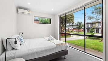4 bedrooms, iron/ironing board, travel cot, WiFi