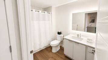 Hair dryer, towels, soap, shampoo