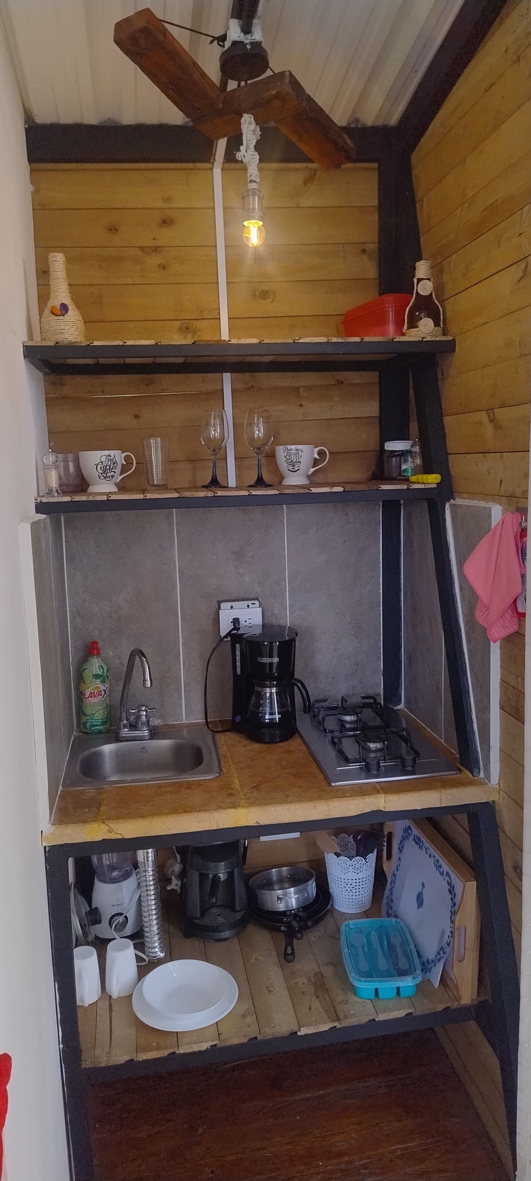 Coffee/tea maker, fridge, dishwasher, cookware/dishes/utensils