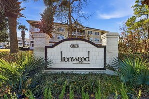 A sign with 'Ironwood' and a building number '5801' in the background. - Condo in Barefoot Resort & Golf in North Myrtle Beach, SC. (North Myrtle Beach)