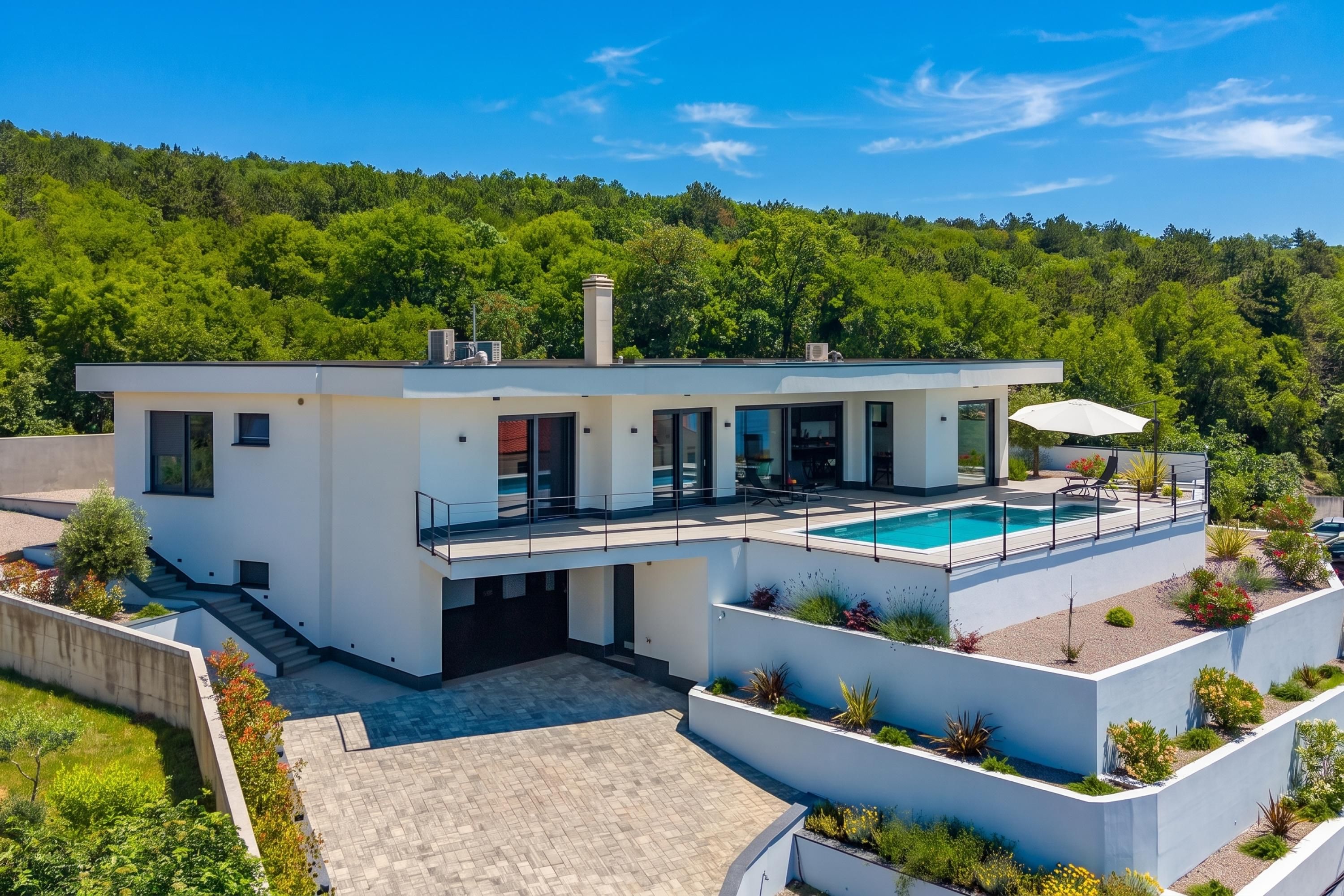 A modern two-story house with a swimming pool, surrounded by greenery.