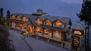 A multi-story hotel with a prominent sign reading 'JUSTA CLIFFEND.' - Justa Luxe Cliffend Resort and Spa Mashobra (Shimla)