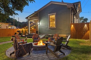 A house with a fire pit in the backyard, outdoor seating, and a covered patio area. - 2mi to Buffalo Trace > GameRoom > HotTub > FirePit (Frankfort)