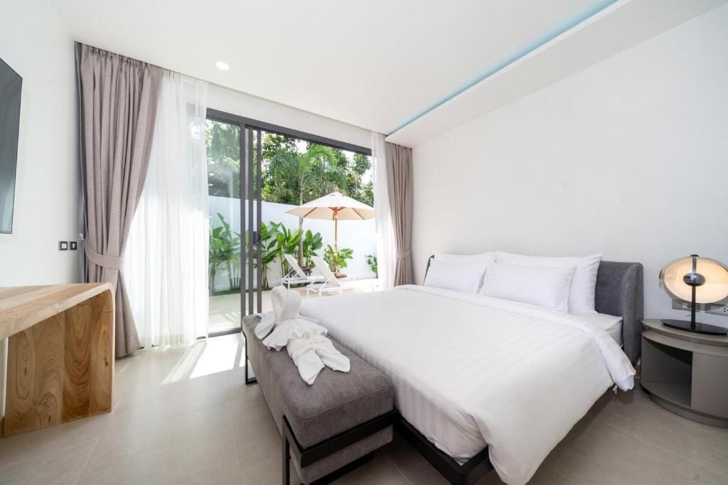 Deluxe Villa, 3 Bedrooms, Patio, Pool View | In-room safe, blackout curtains, iron/ironing board, free WiFi