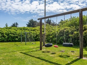 A playground with a swing set and a soccer goal. - "Isabel" - 650m from the sea by Interhome (Løkken)