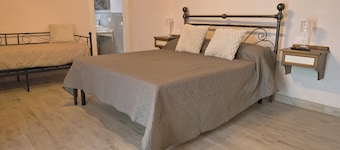 Two-room apartment with 1 double bed, 1 single bed, and a kitchen