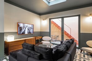 Luksusleilighet, 1 queensize-seng med sovesofa | Oppholdsområde