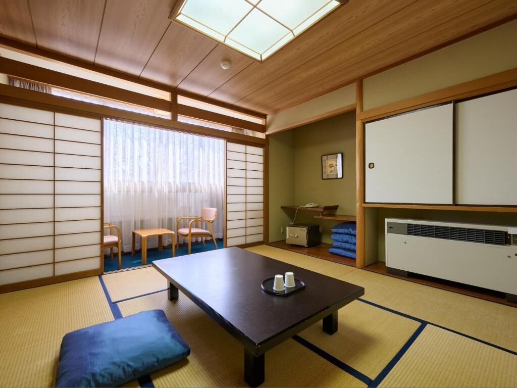 Habitació quàdruple tradicional, no fumadors (Japanese-Western Style) | Escriptori, wifi gratuïta i roba de llit 
