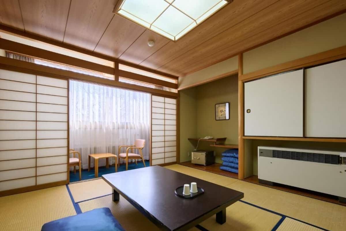 Traditional Quadruple Room, Non Smoking (Japanese-Western Style) | Desk, WiFi (free), bed sheets